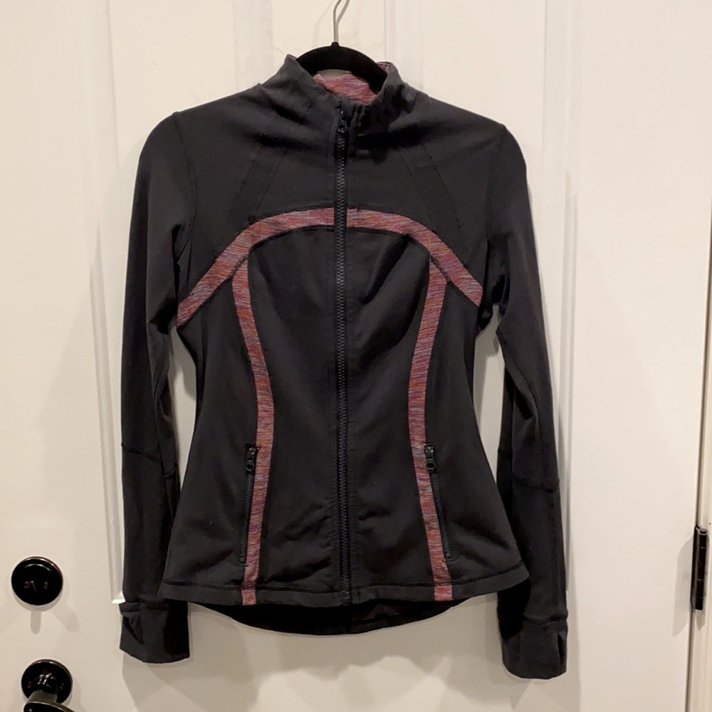 Define Jacket. Dark Gray with multi color accent.